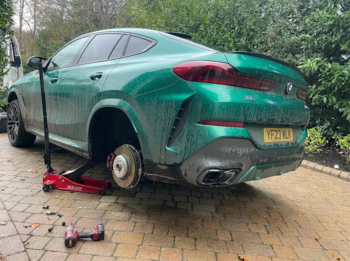 BMW X6 rear wheel removed during a mobile tyre replacement